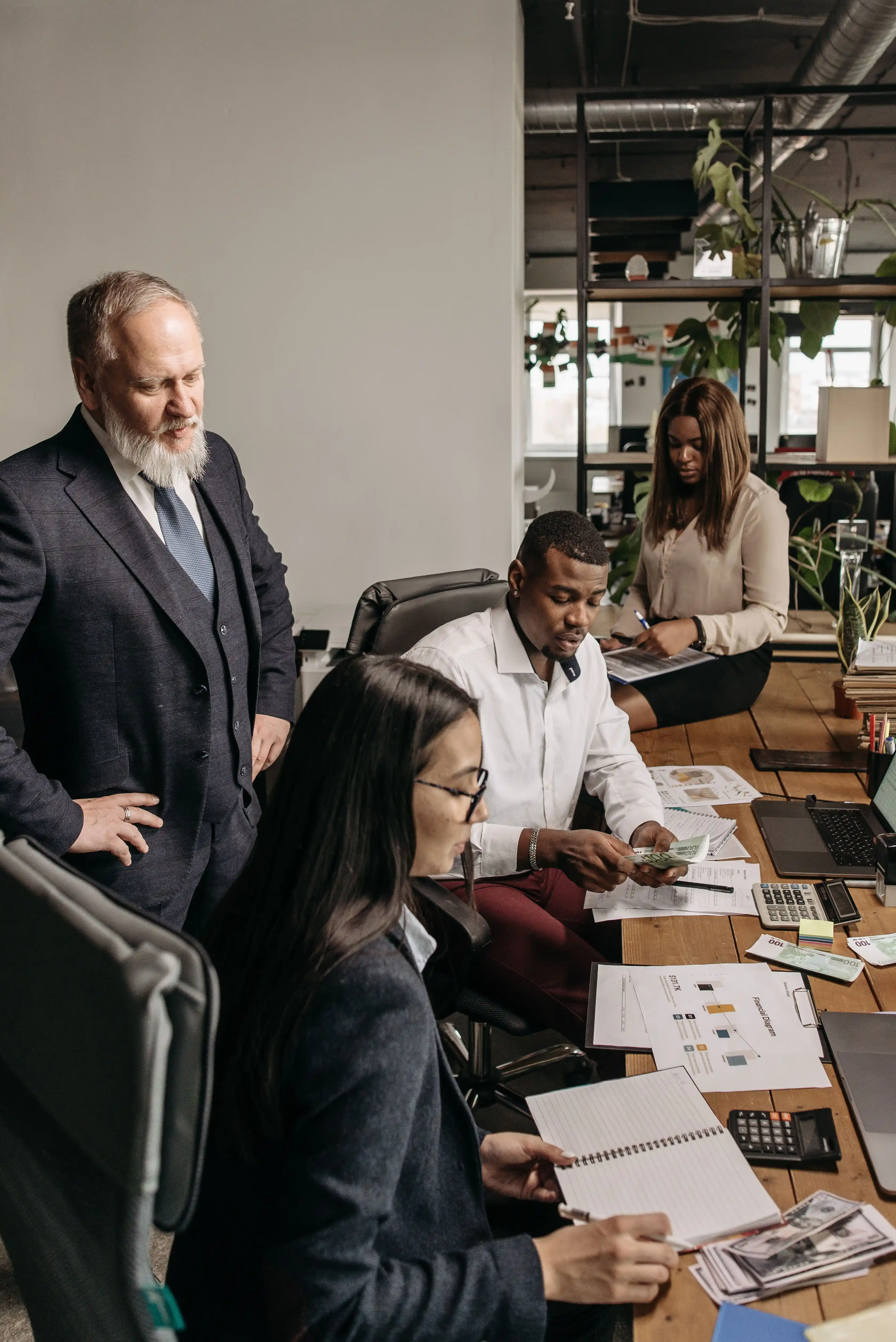 Investment committee discussing long-term portfolio strategy